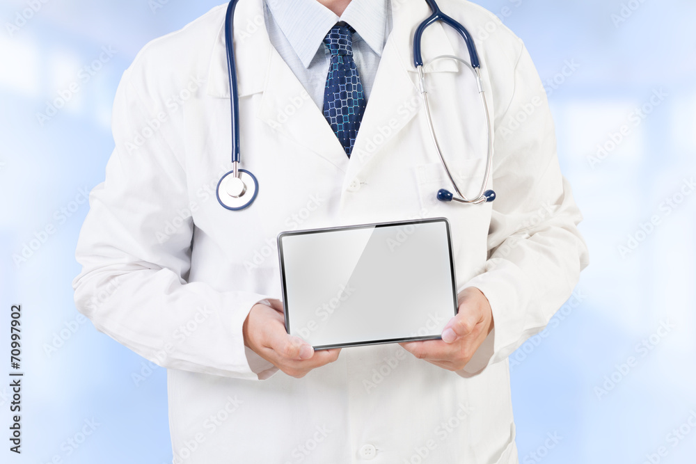 Doctor holding tablet with copy space Doctor holding tablet with copy space