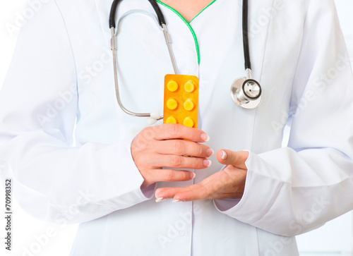 Female doctor with pills