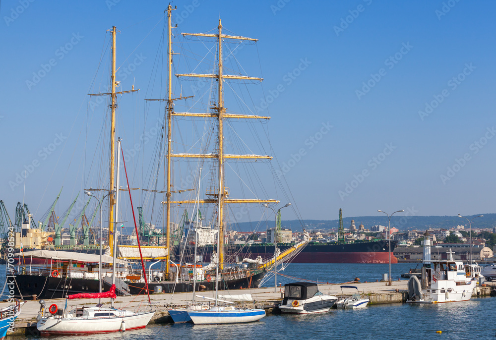 Big sailing ship and pleasure boats in port of Varna, Bulgaria Big sailing ship and pleasure boats in port of Varna, Bulgaria