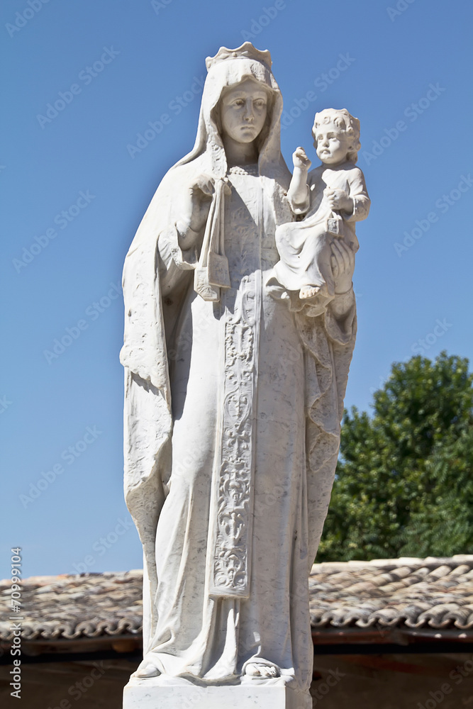 Fototapeta premium old cemetery sculpture of the Virgin