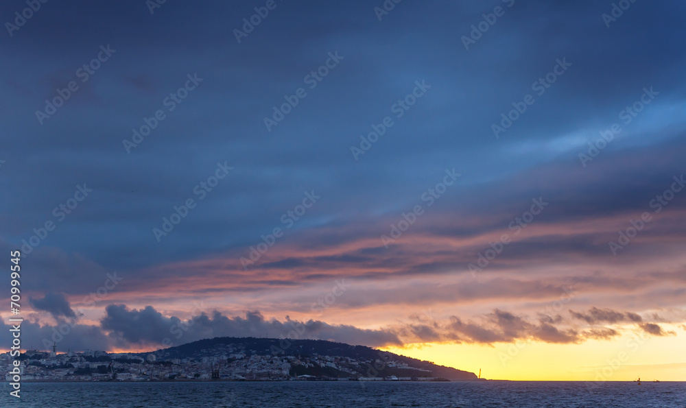 Bright sunset sky background. Bay of Tangier, Morocco
