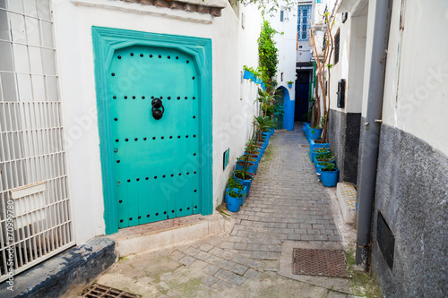 White walls and green door. Medina, old part of Tangier, Morocco