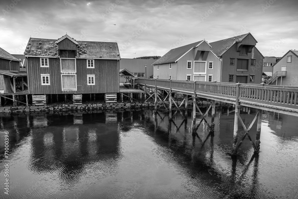 Wooden houses on the coast in Norwegian fishing village. Rorvik,