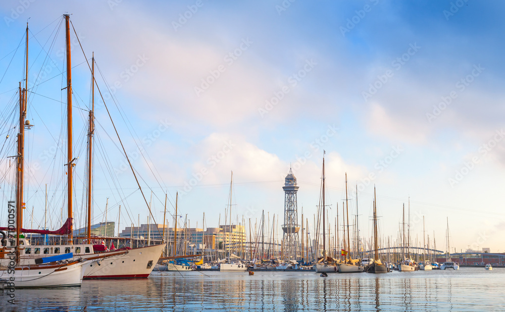 Sailing ships and yachts moored in Port of Barcelona, Spain