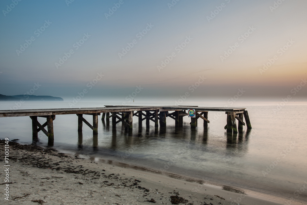 Sunrise at the pier in Sopot, Poland. 