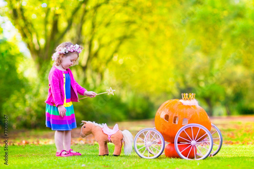 Little sweetn girl playing Cinderella photo