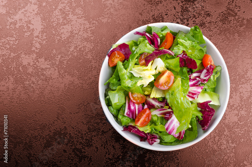 Fresh mixed salad with endive and cherry