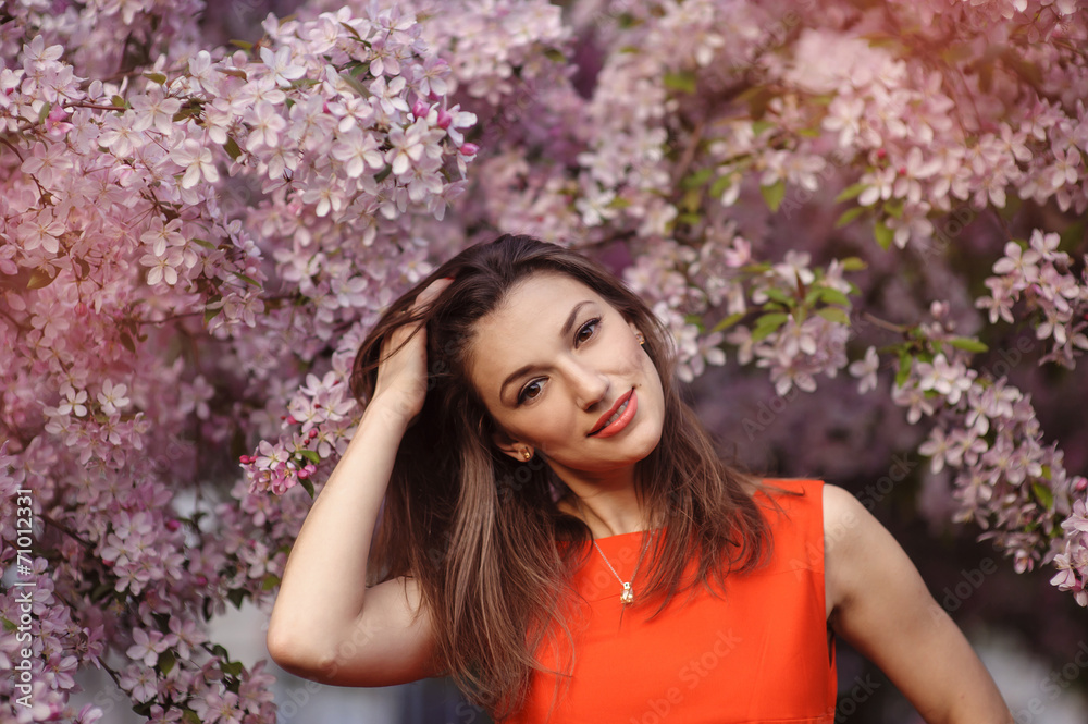 beautiful young brunette woman on the meadow with white flowers beautiful young brunette woman on the meadow with white flowers