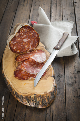 Lonchas de morcón ibérico recién cortado para comer photo