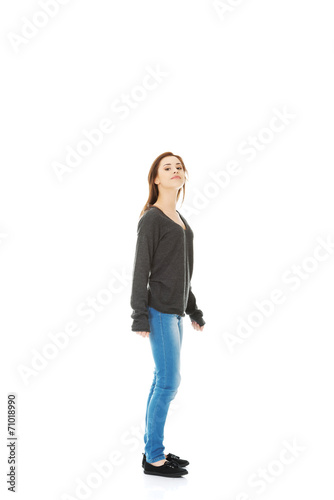 Young casual woman, student jumping.