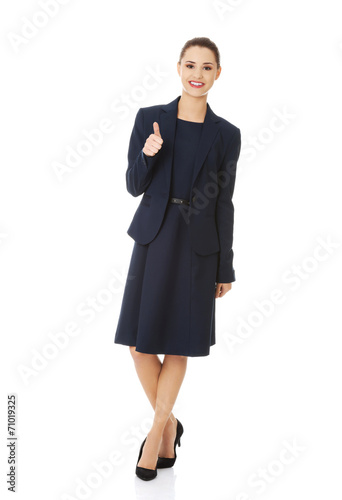 Happy business woman with ok hand sign