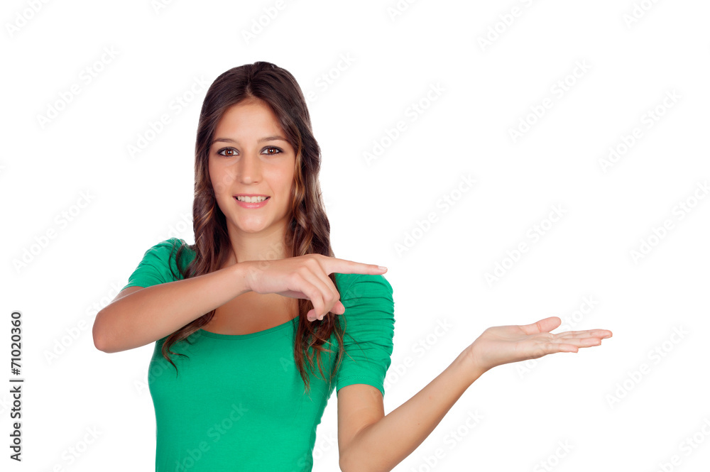 Attractive casual girl in green with the hand extended Attractive casual girl in green with the hand extended