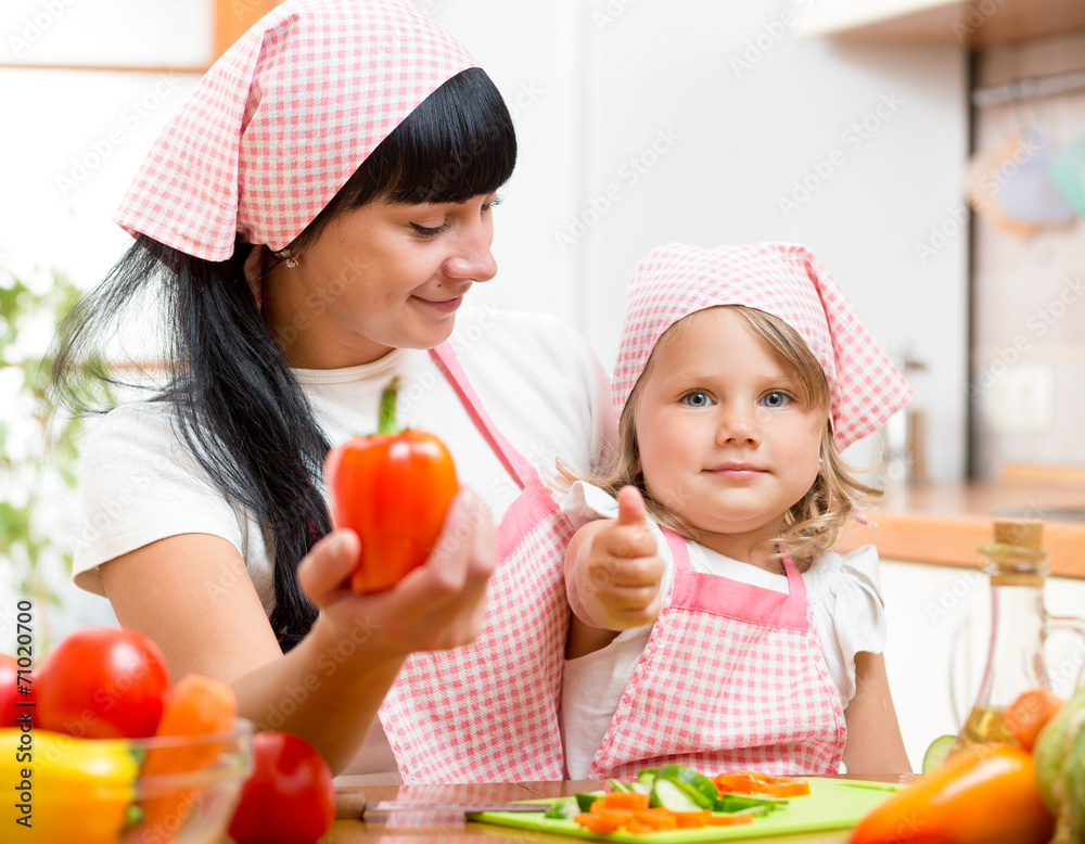 Kid girl with healthy food and showing thumb up Kid girl with healthy food and showing thumb up