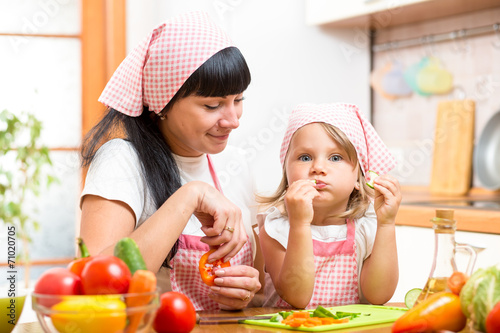 child eating healthy food o...