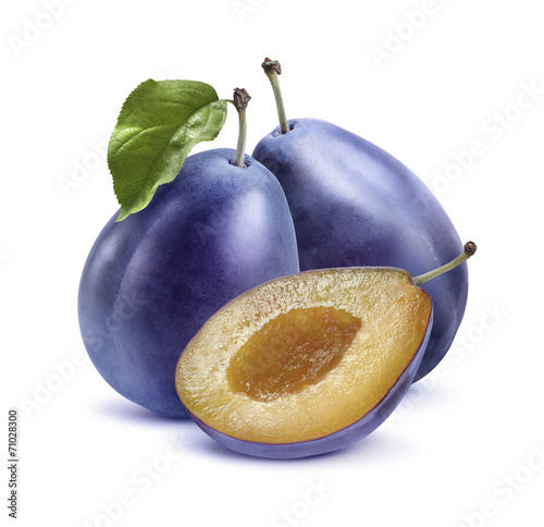 Two blue plums and half isolated on white background