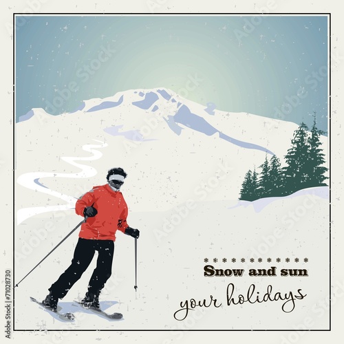 Mountain skiing. Skier slides from the mountain.