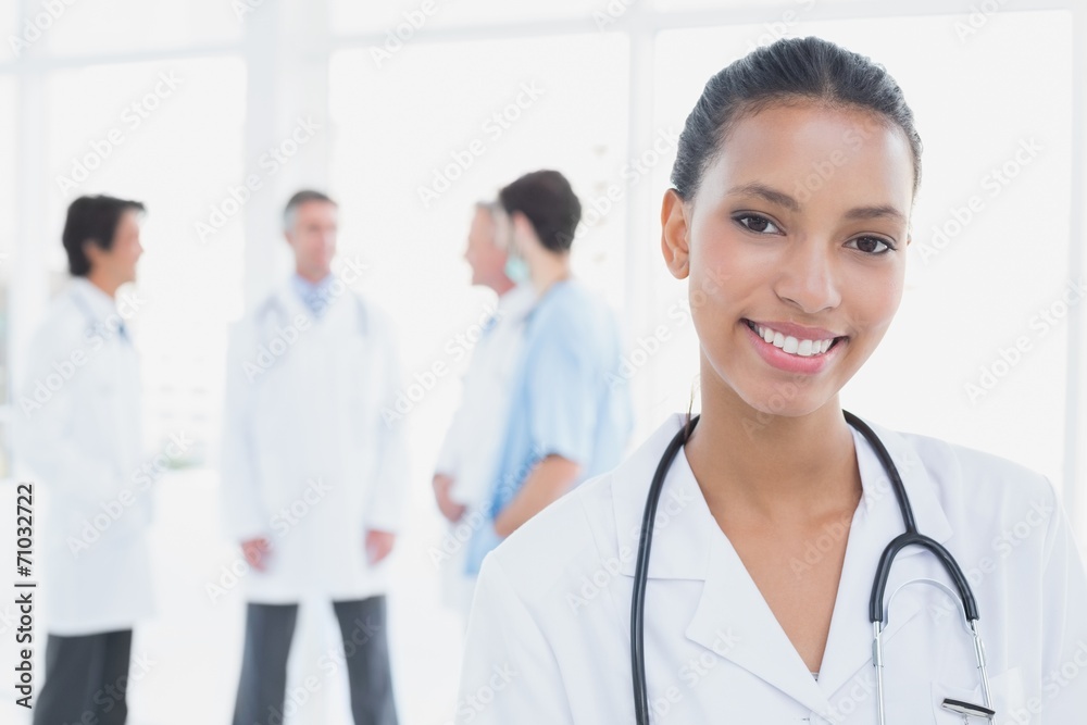 Smiling doctor looking at camera Smiling doctor looking at camera