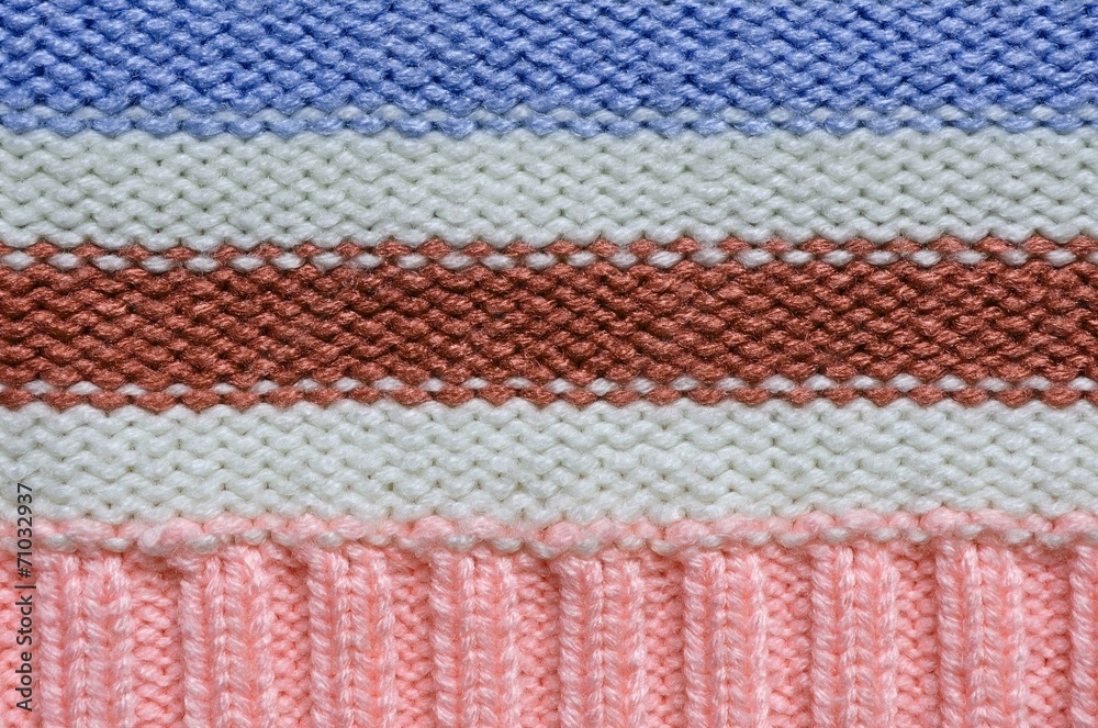 Knit woolen texture. Fabric striped background Knit woolen texture. Fabric striped background