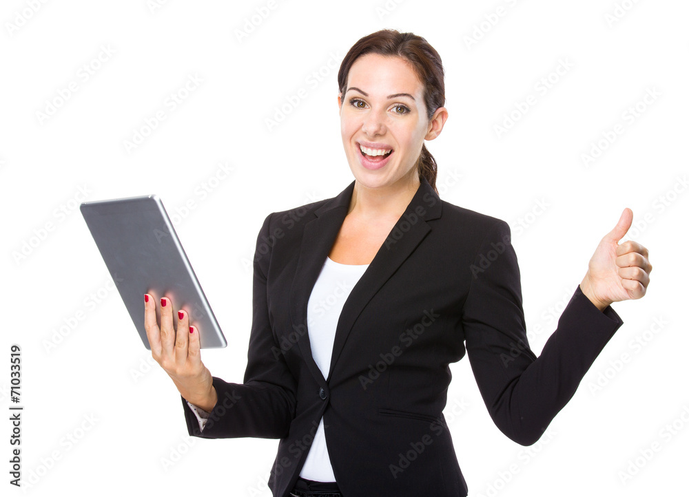 Businesswoman use of tablet and thumb up Businesswoman use of tablet and thumb up