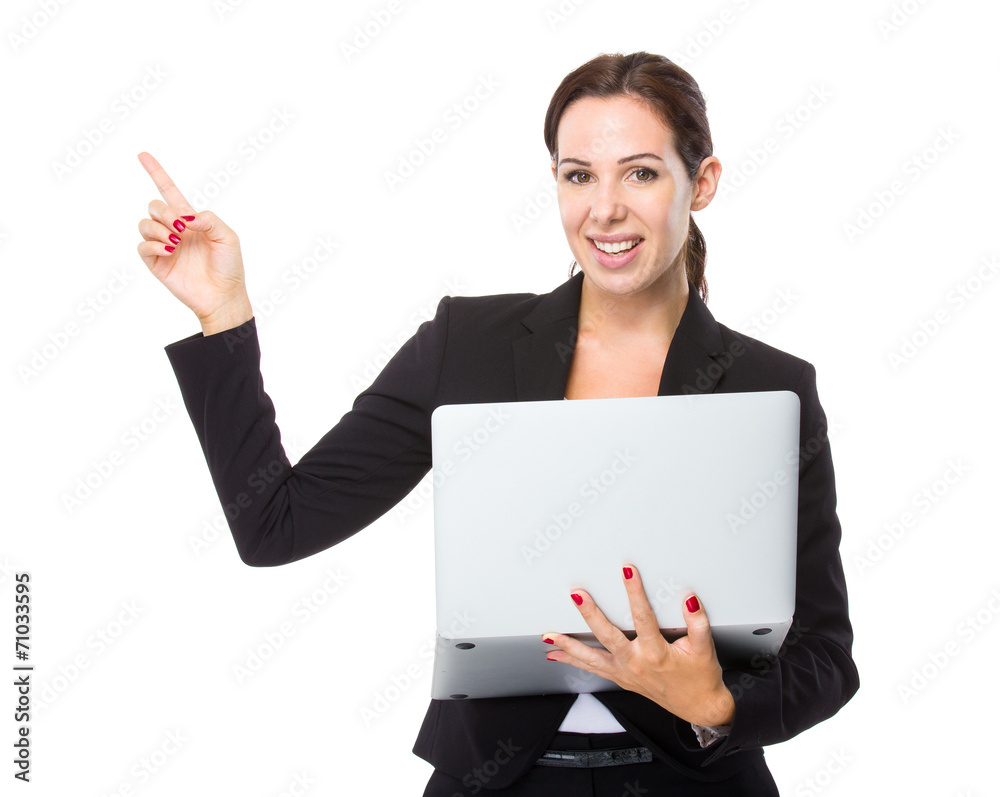 Businesswoman use of computer and finger up Businesswoman use of computer and finger up