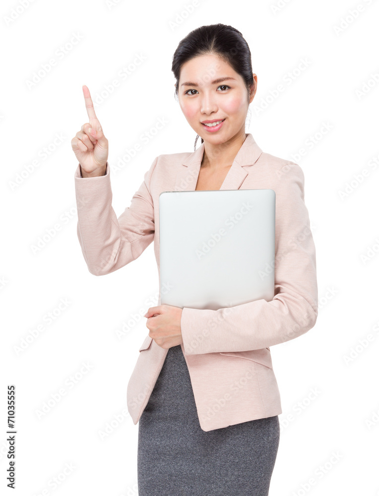 Asian businesswoman with laptop and finger point up Asian businesswoman with laptop and finger point up