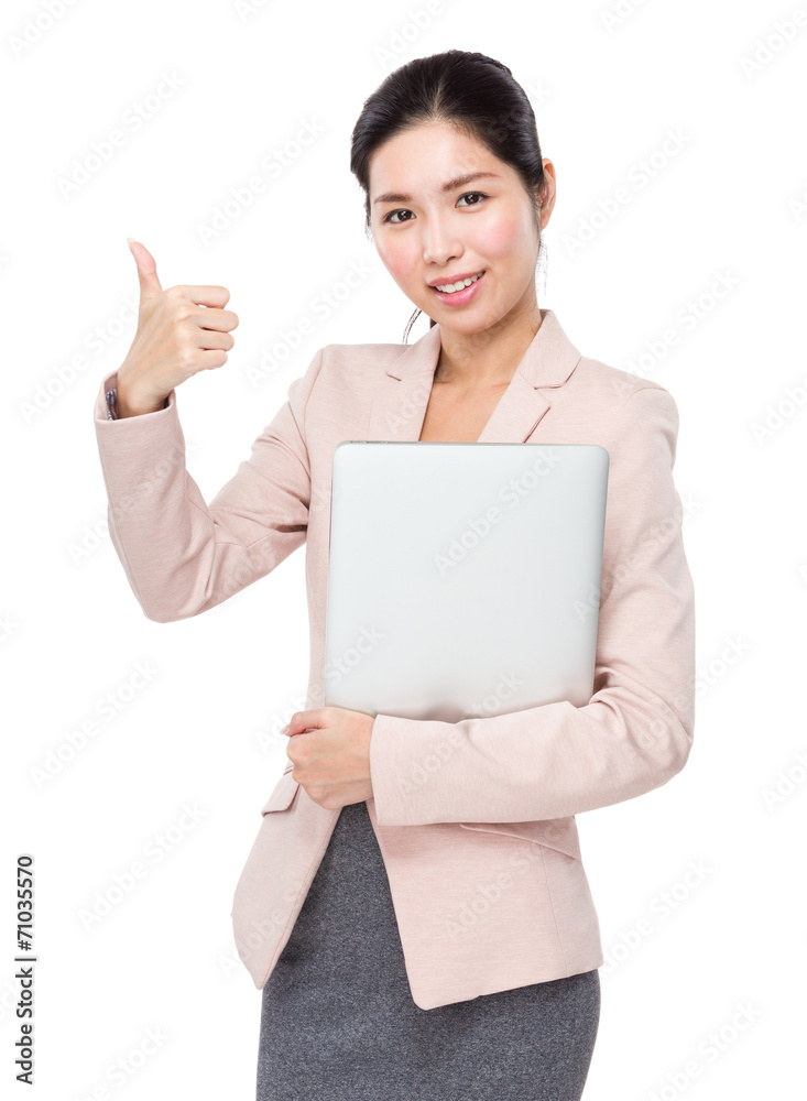 Asian businesswoman with laptop and thumb up Asian businesswoman with laptop and thumb up