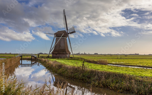 Dutch windmill in polder