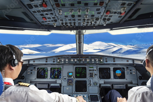 Pilots in the plane cockpit