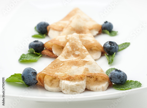 Pancake with blueberry isolated on white