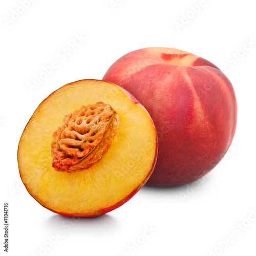 One and half red peach isolated on white