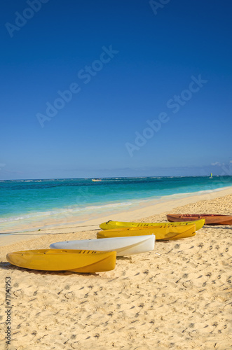 Colourful kayaks on an exotic beach, Caribbean Islands