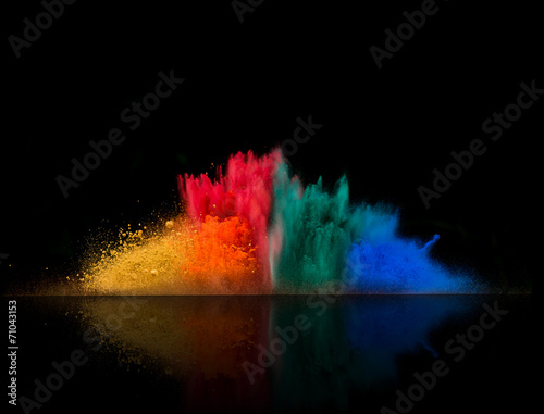 colored dust explosion on black background
