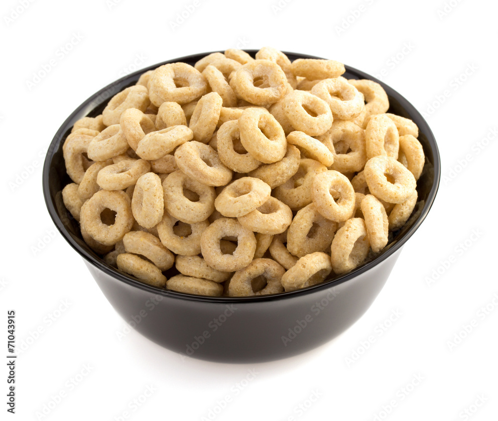 corn flakes rings in bowl on white corn flakes rings in bowl on white
