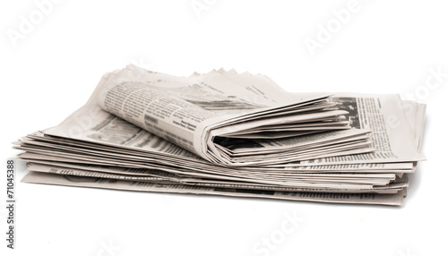 Closeup of stack of newspapers photo