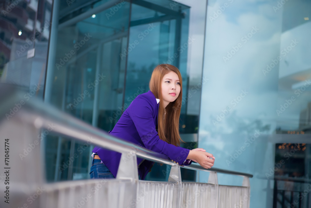 Portrait of pretty businesswoman on the modern background Portrait of pretty businesswoman on the modern background