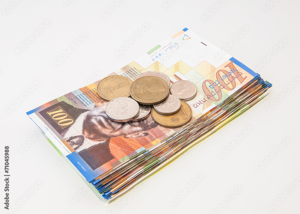 stack of israeli shekel notes with coins stack of israeli shekel notes with coins