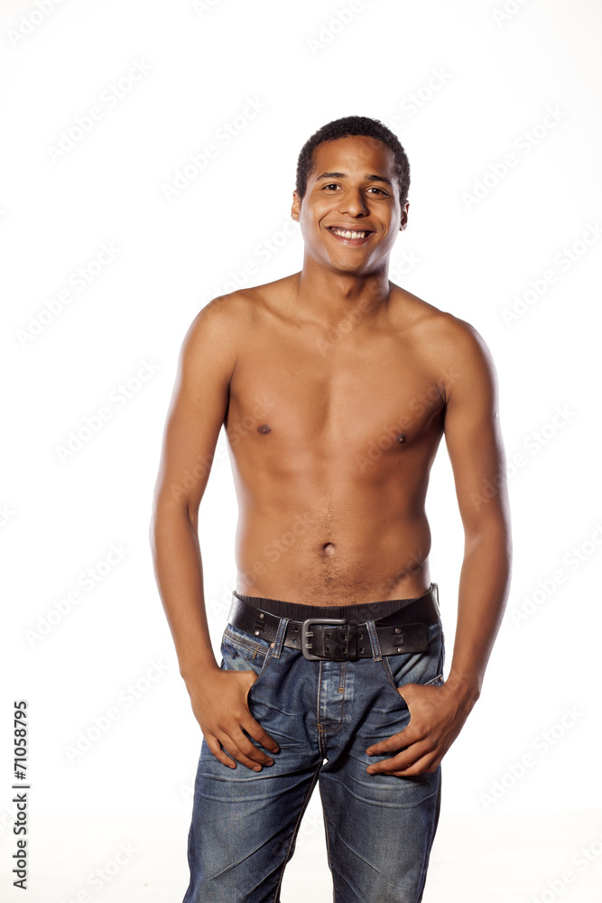 half-naked young dark-skinned man standing on white background half-naked young dark-skinned man standing on white background