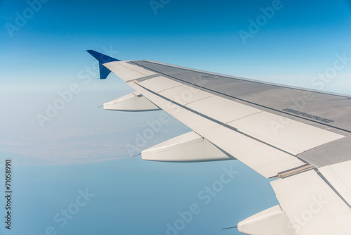 Airplane wing out of window