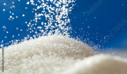 Принти на полотні sugar on a blue background