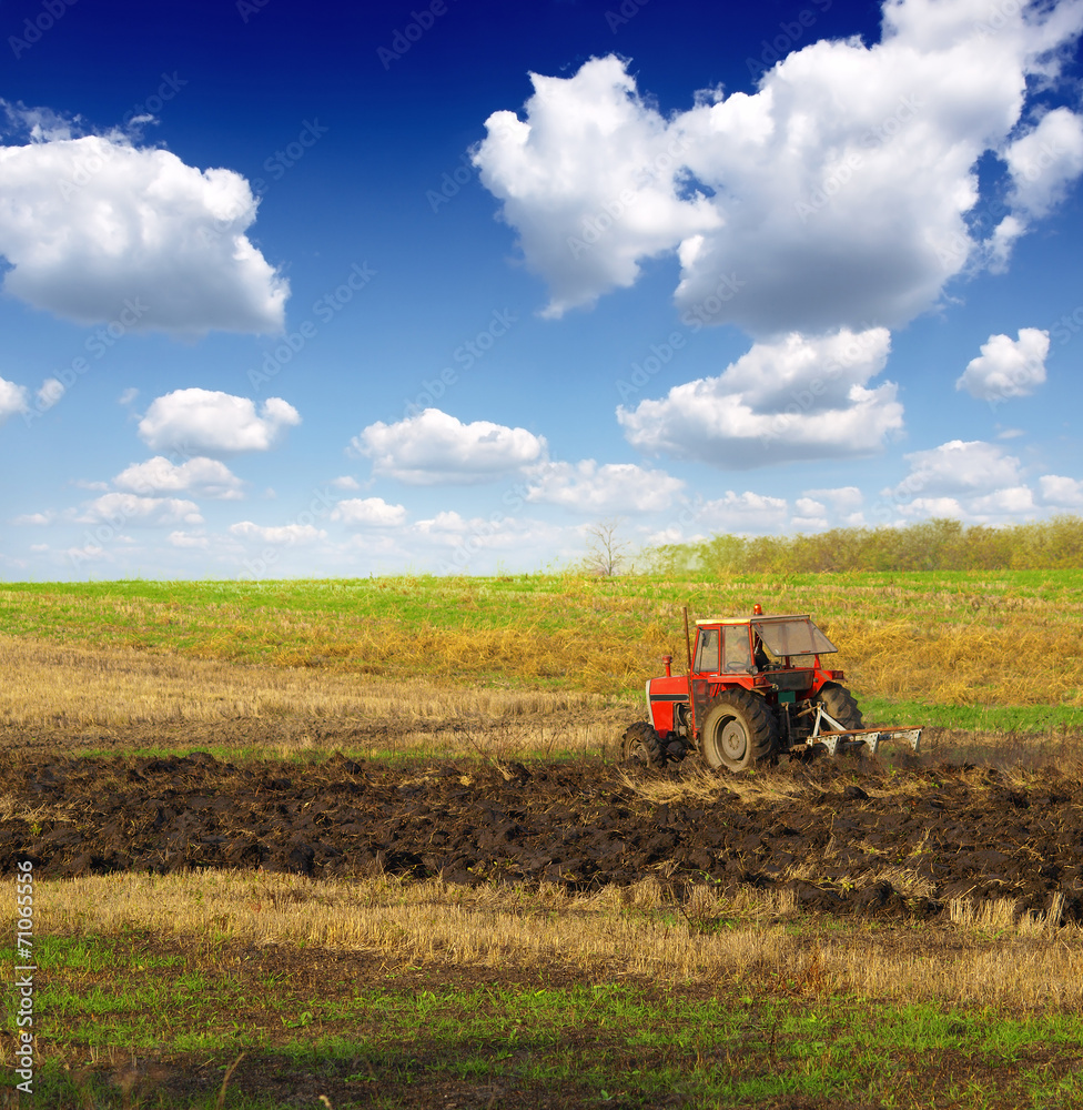 Tractor plowing Tractor plowing