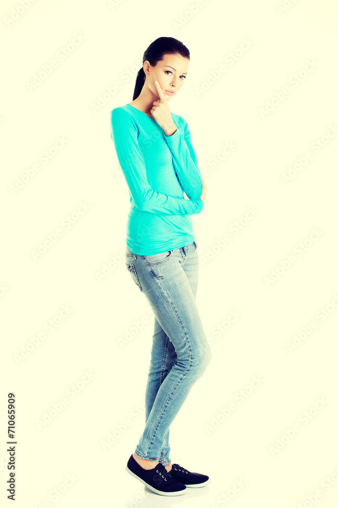 Thoughtful female student, isolated on white Thoughtful female student, isolated on white