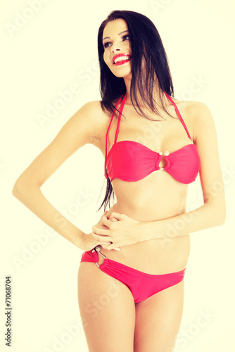 Sexy summer woman wearing swim wear. © Piotr Marcinski