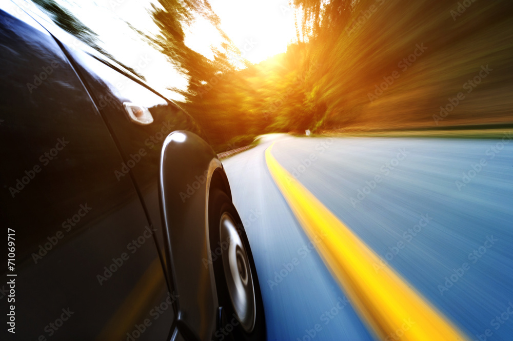 Obraz premium car on the road with motion blur background.