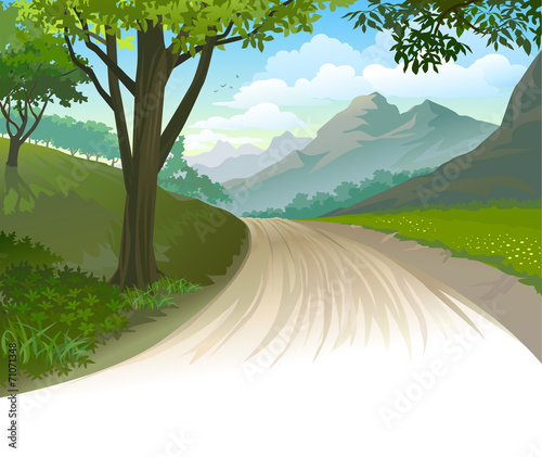 A dirt road leading to the rocky mountains