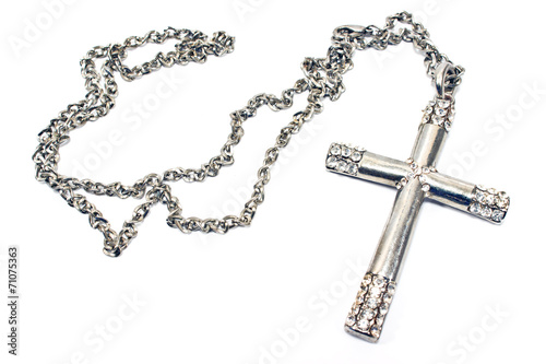Silver christian cross necklace isolated on white