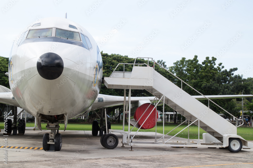 Fototapeta premium Airplane nose with passenger stairs