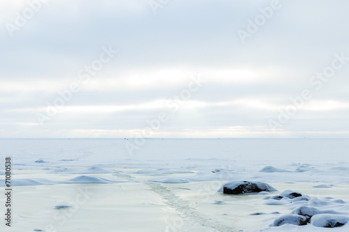 frozen Icy coastline of the bay