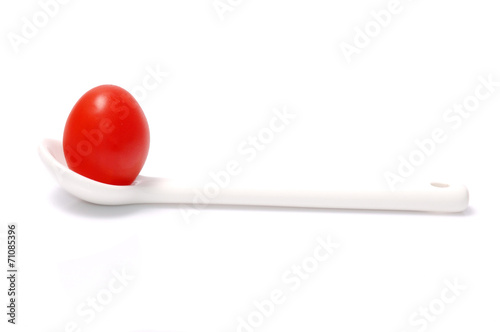 tomato on spoon