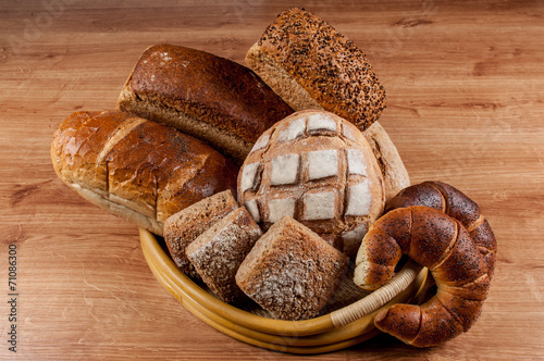 Group of different bread's type on wooden table