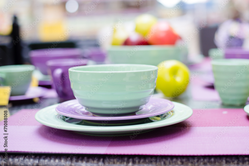 cute green and purple dinnerware sold in the supermarket